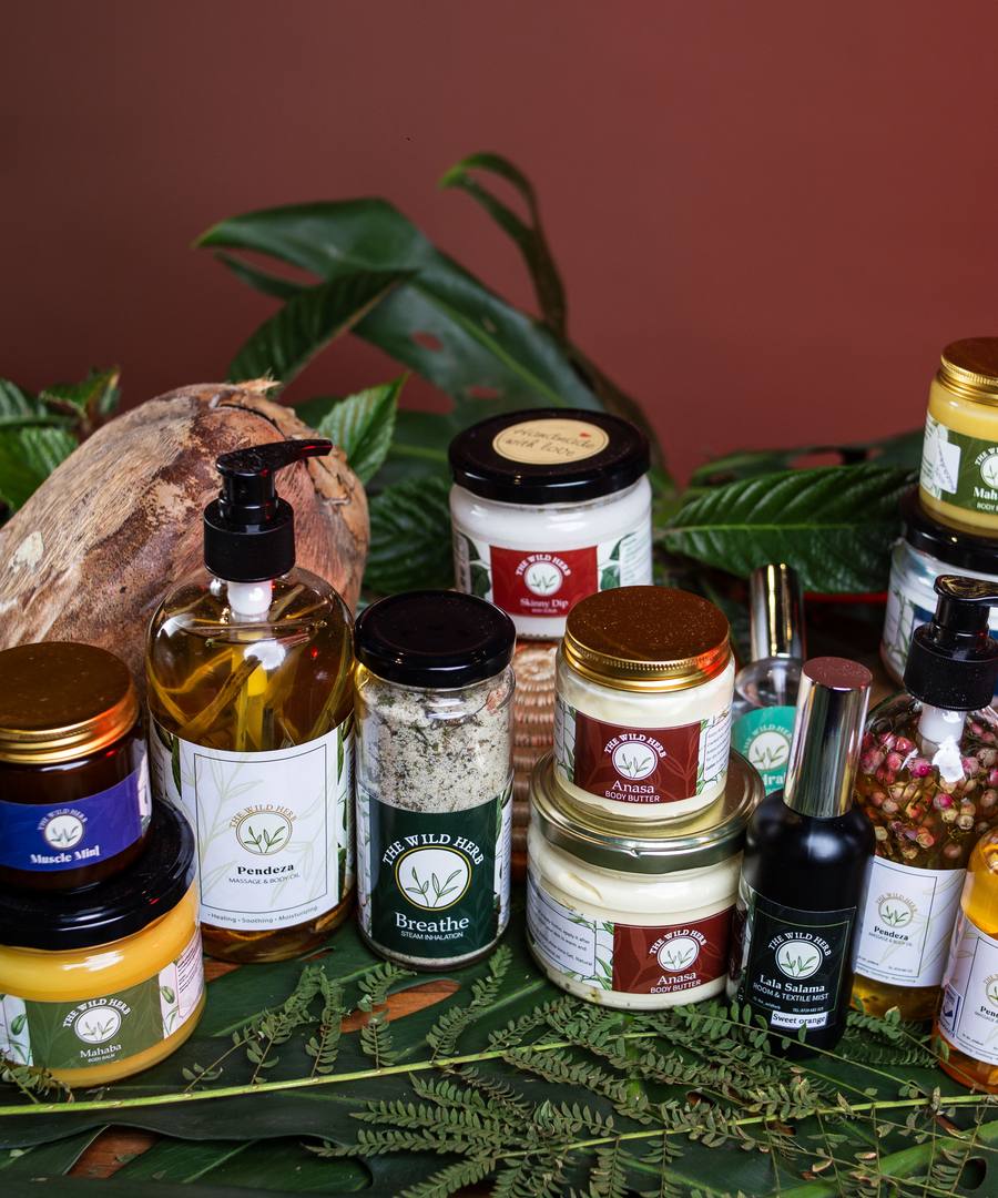 The full Wild Herb range — balms, steams, soaks, oils and mists, photographed together